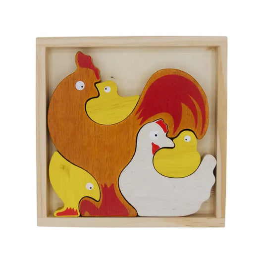 Wooden puzzle pieces in the shape of a rooster, a hen, and three chicks fit into each other inside a wooden box.