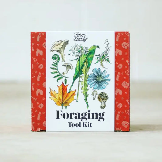 Red and white box with illustrations of leaves, mushrooms, ferns, and flowers.