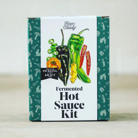 Teal and white box with illustrations of different types of peppers.