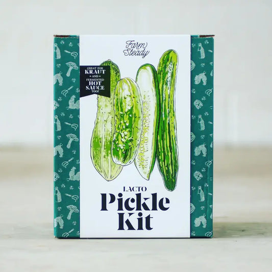 Teal and white box with illustration of pickles.