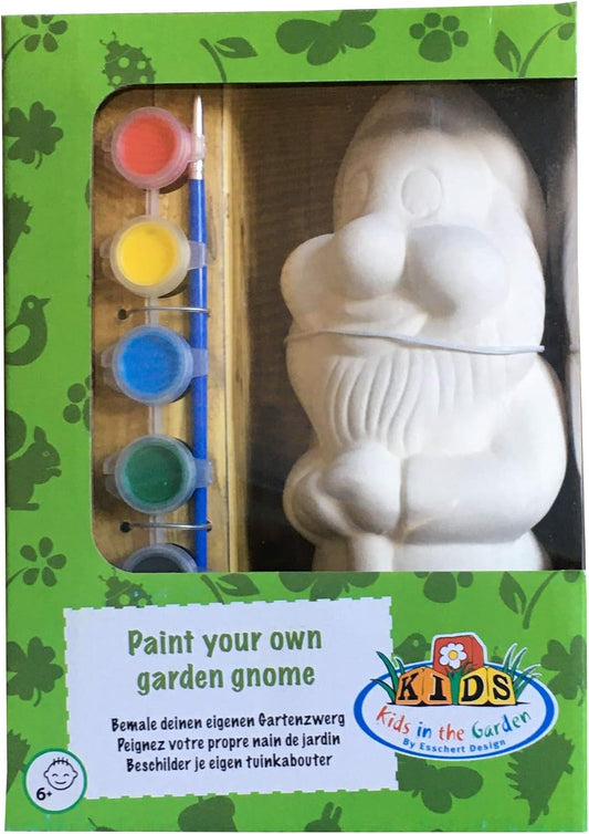 A green box with clear plastic in the front. Through the plastic a white gnome, small paint tubs and a paintbrush are visible.
