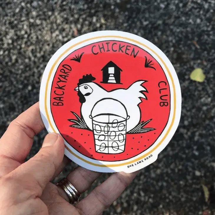 Round sticker with the text "Backyard Chicken Club" and an illustration of a hen next to a basket of eggs with a coop in the background.