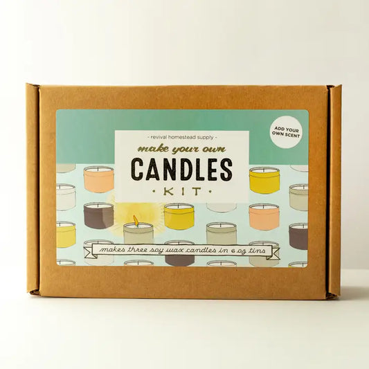 Cardboard box. Label reads "make your own candles kit" and has illustrations of candles in small tins.